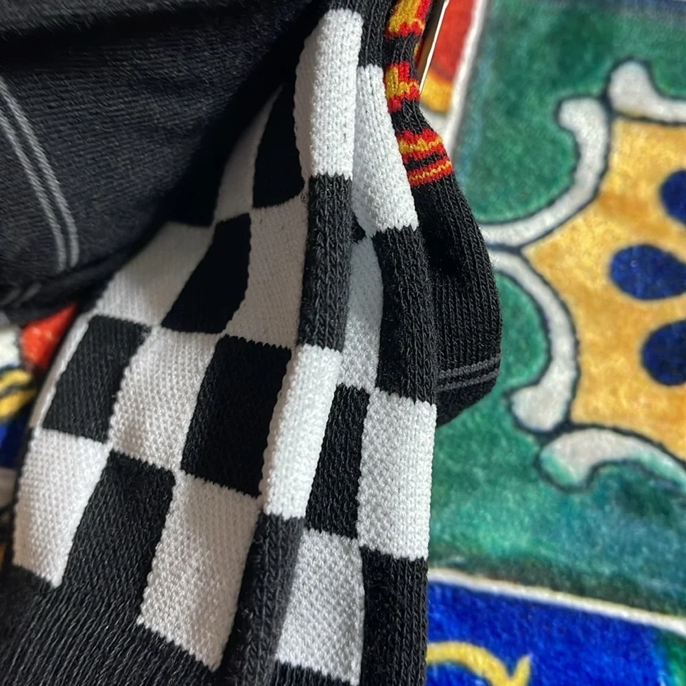 Two sets of socks - Def Leppard and Top Gun